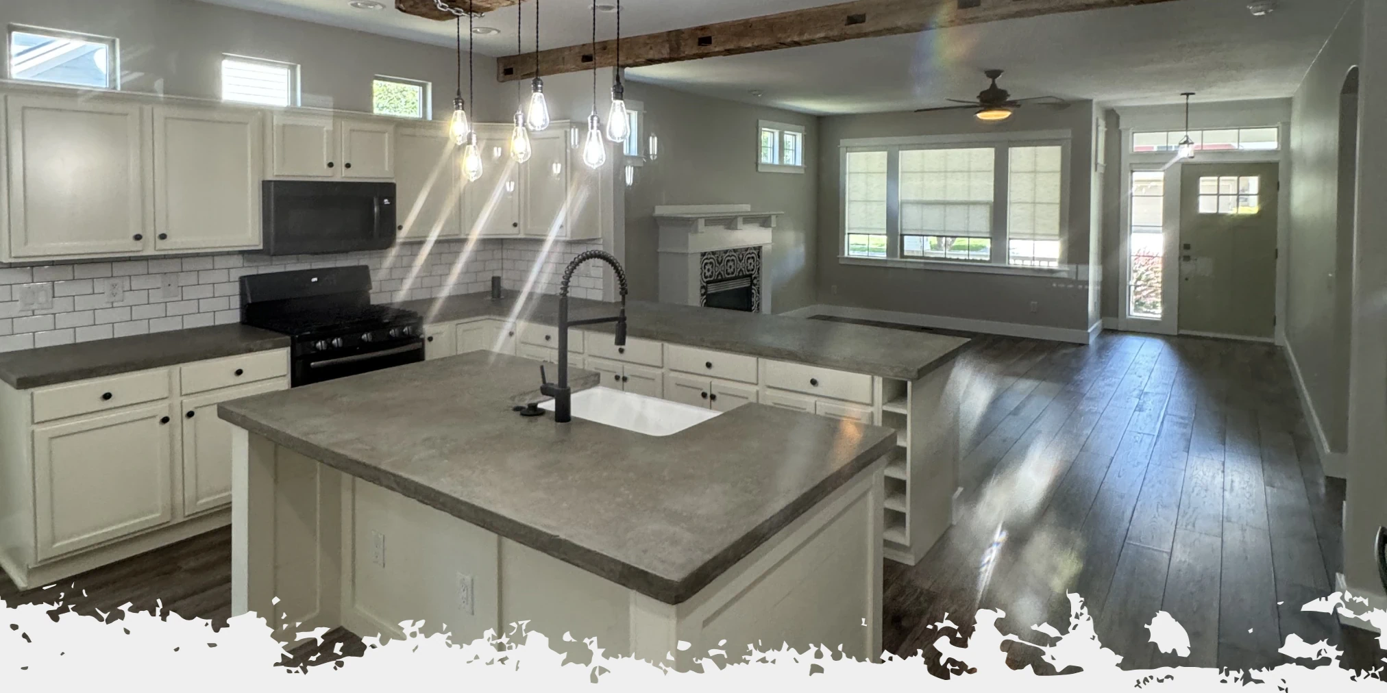 A repainted kitchen with cleanly painted cabinets, walls, and ceiling done by JLS Painting